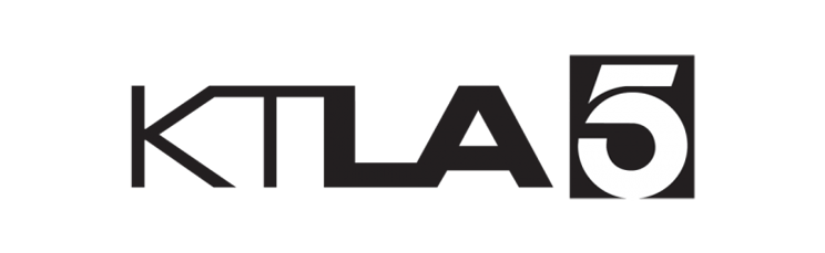 KTLA 5-Logo mit dem fetten, schwarzen, modernen Schriftzug "KTLA" und einer großen, weißen Zahl "5" in einem soliden schwarzen Quadrat auf der rechten Seite, vor einem hellgrauen Hintergrund.